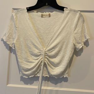Alter’d State cream color top - adjustable string in front. Size small.